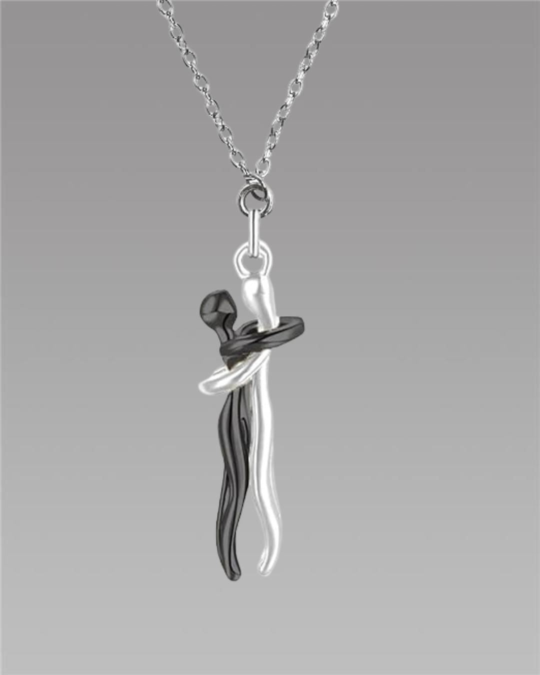 Silver and black hug couple chain pendant set — stylish matching jewelry for couples from Big Shot Fusion