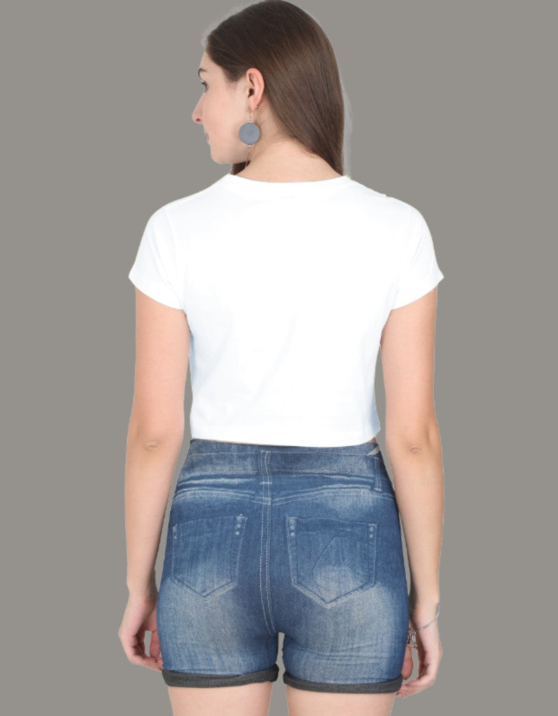 Model wearing a white crop top with rainbow-colored PRIDE text and slogans “Love Loud” and “Love Proud”