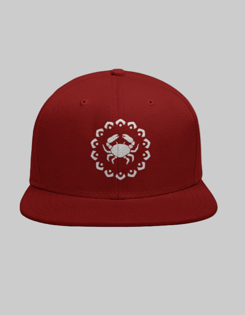 Red Snapback cap with white Cancer zodiac crab symbol inside a mandala-style pattern.