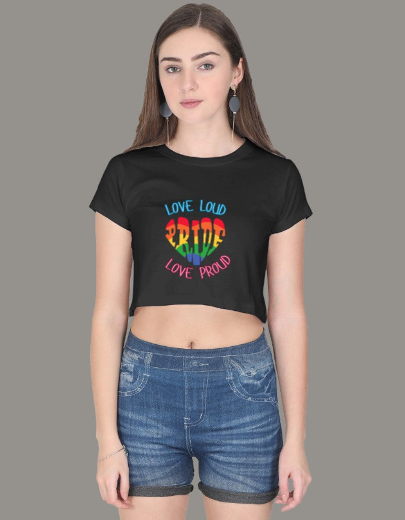 Model wearing a black crop top with rainbow-colored PRIDE text and slogans “Love Loud” and “Love Proud”